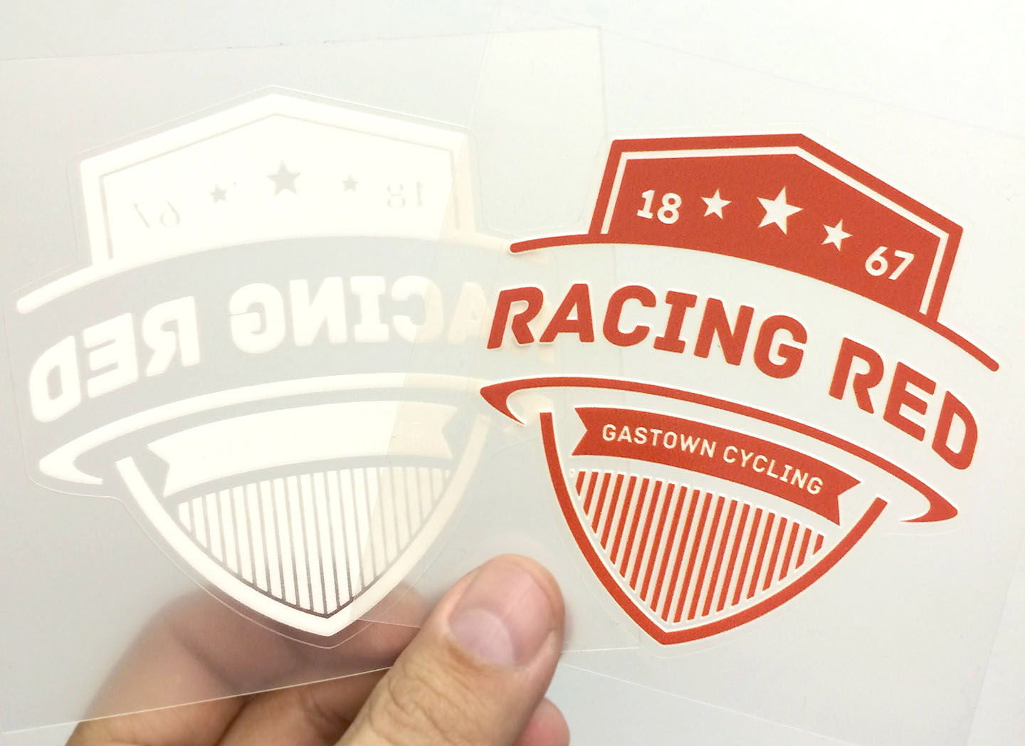Custom printed decals with white ink under flood on clear vinyl.